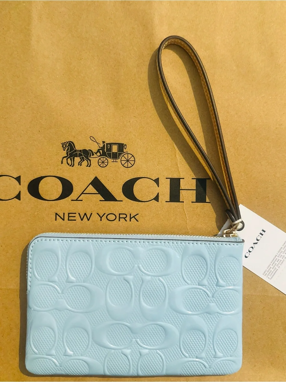 Coach Light Blue Embossed Signature Wristlet